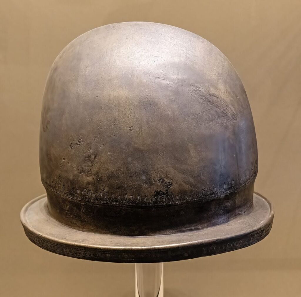 (Venice) Ancient Roman statues in the Museo archeologico nazionale - Etruscan helmet