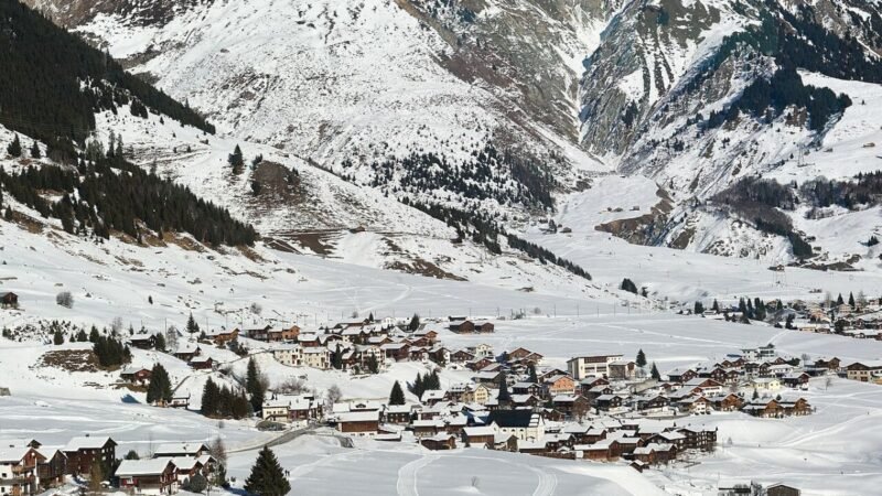 Town in Swiss Alps seen from Glacier Express Switzerland